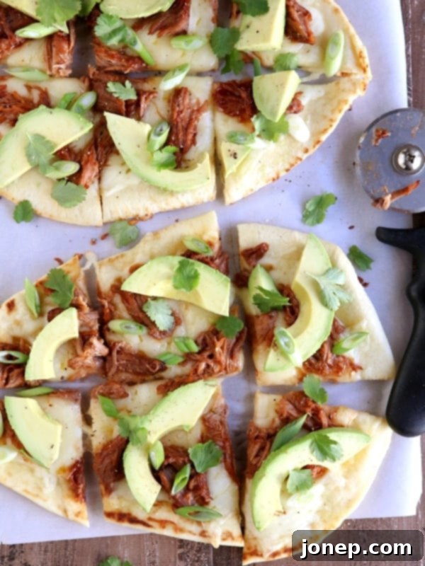 Completed BBQ Pulled Pork and Avocado Flatbread Pizzas Ready to Serve