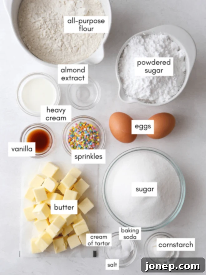 Frosted Sugar Cookie Cake 4 An array of fresh ingredients for baking a sugar cookie cake, including butter, flour, sugar, and eggs.
