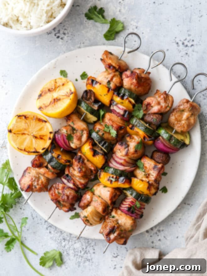 grilled lemon-cilantro veggie skewers on a plate