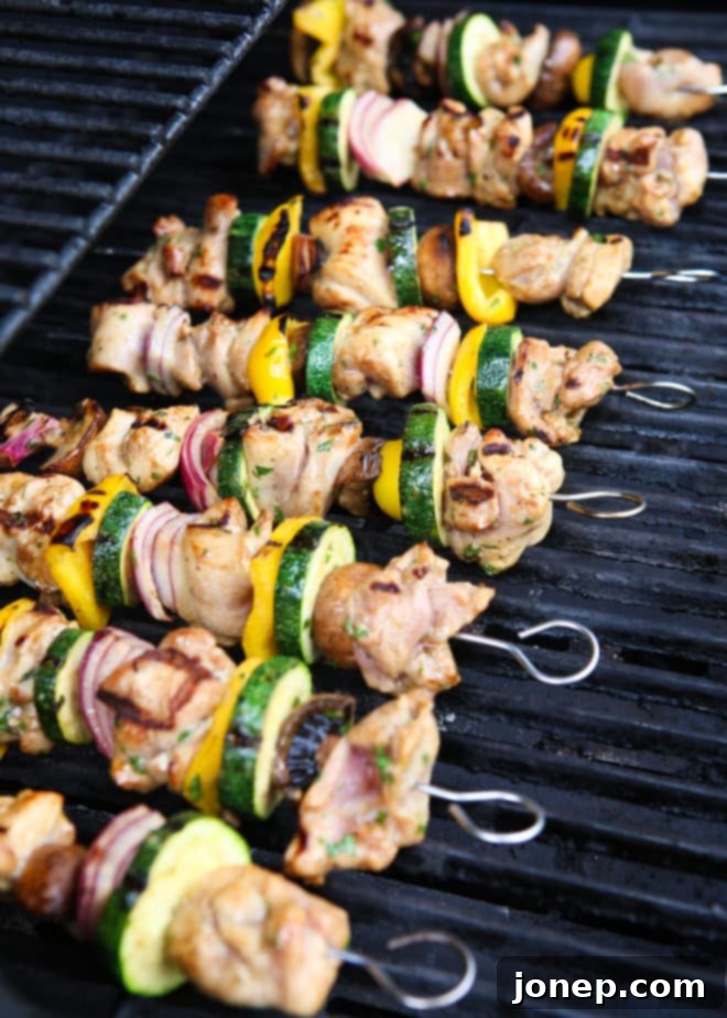 grilling lemon-cilantro chicken and veggies skewers