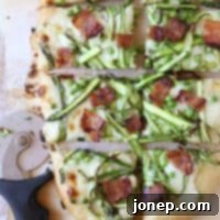 Shaved asparagus, pea and bacon pizza from completelydelicious.com