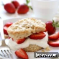 Morning Strawberry Shortcake Delights 2 Breakfast Strawberry Shortcakes with heartier biscuits and vanilla yogurt | completelydelicious.com
