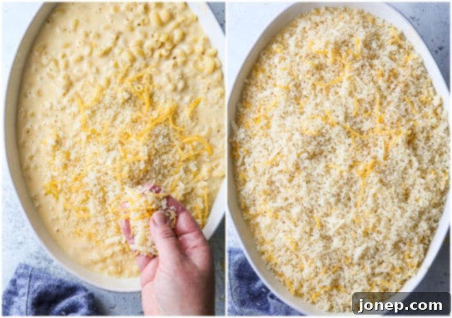 Sprinkling crispy breadcrumb topping over creamy macaroni and cheese in a baking dish