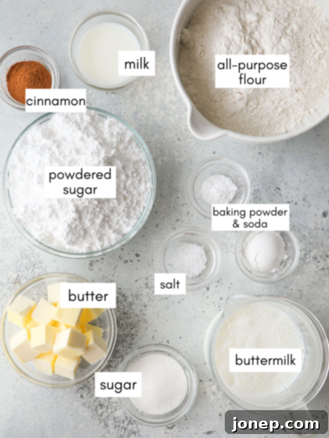Sweet Cinnamon Swirl Biscuits 4 cinnamon roll biscuits ingredients laid out on a table