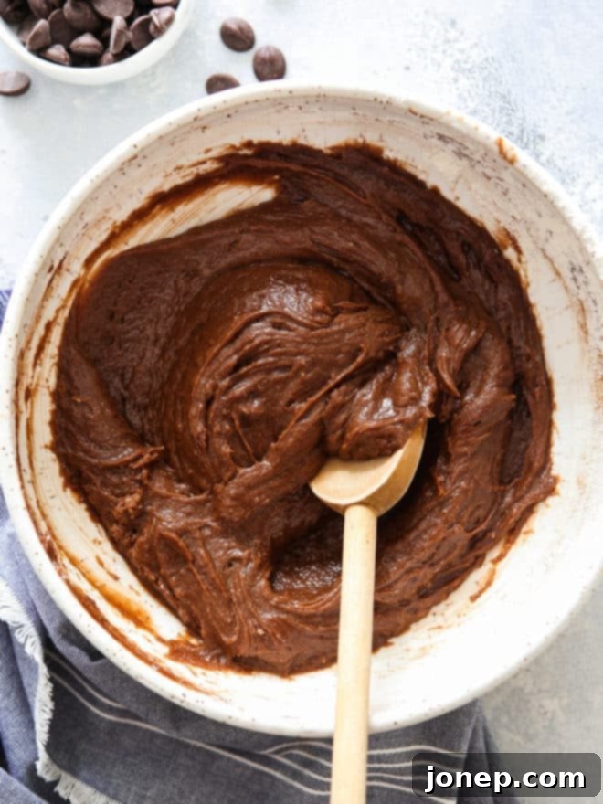 brownie batter in a mixing bowl, ready for baking