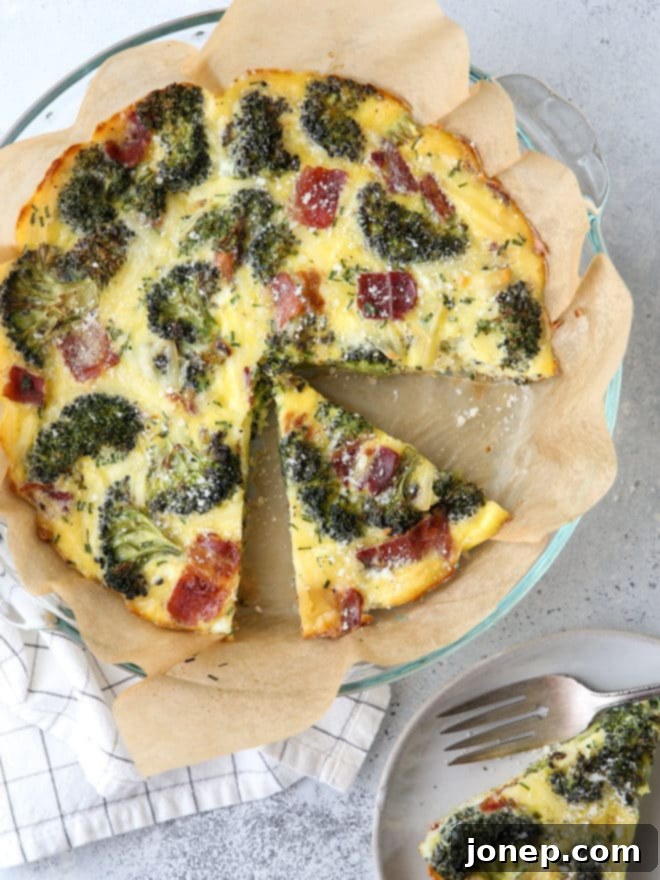 A breakfast bake filled with roasted broccoli, bacon, Gruyere cheese, eggs and chives. It’s a quiche minus the fussy pie crust!