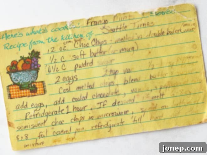 An old, cherished recipe card for Frango mint fudge, showing handwritten notes and a vintage feel