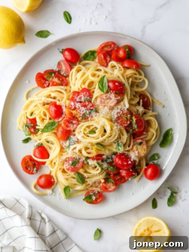 Bright Lemon Tomato Basil Pasta 8 lemon pasta with tomatoes and basil on a plate