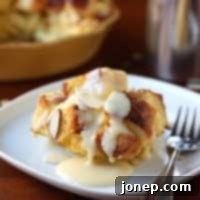 Warm Almond Bread Pudding with Spiced Eggnog Sauce 2 Almond Bread Pudding with Eggnog Sauce