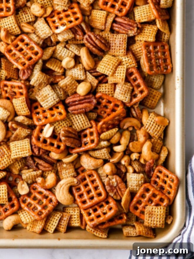 Sweet Maple Nut Medley 2 Closeup of perfectly baked maple nut snack mix with a golden-brown coating