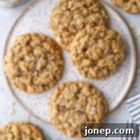 Perfectly Chewy Oatmeal Cookies 7 Close-up of baked chewy oatmeal cookies, golden and perfectly textured