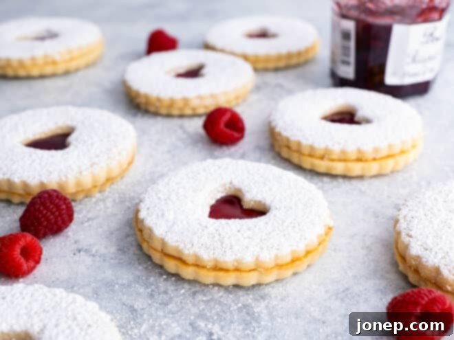 Classic Raspberry Almond Linzer Cookies 3 Close-up of baked Linzer cookie halves before assembly