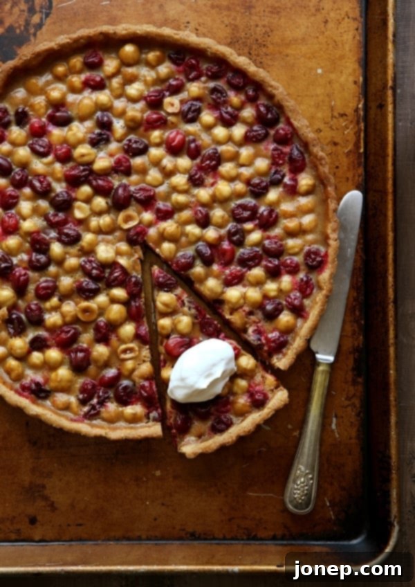 Rich Cranberry, Caramel and Hazelnut Tart, perfect for fall and winter desserts