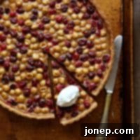 Cranberry, Caramel and Hazelnut Tart | completelydelicious.com