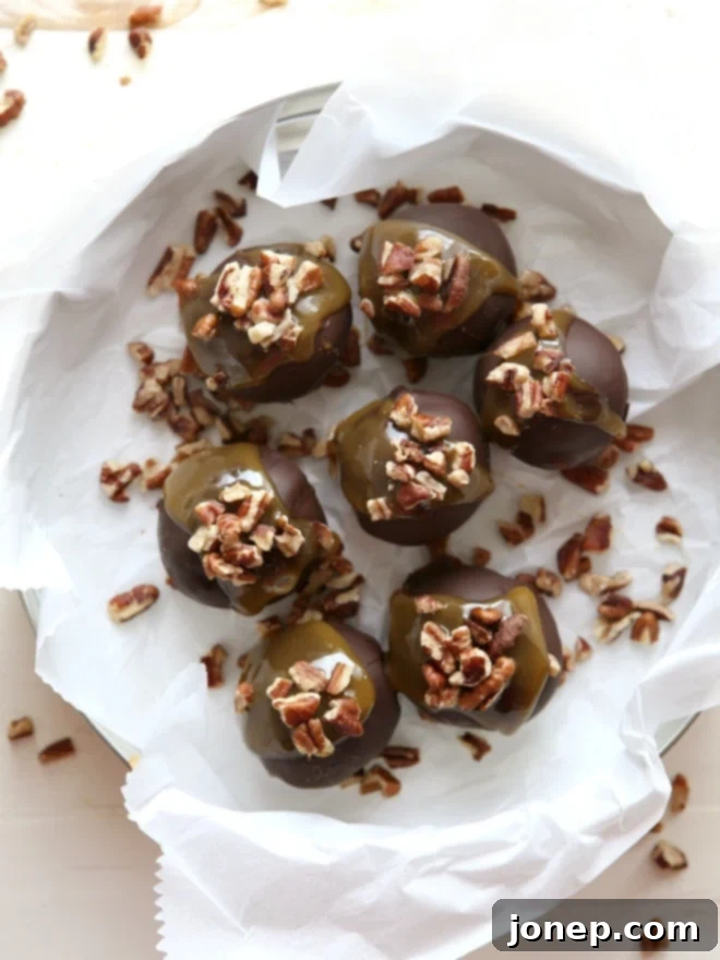 Turtle Cookie Truffles with pecans, caramel and chocolate, a perfect holiday treat | completelydelicious.com