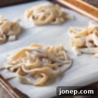 Homemade Pasta Perfection 2 Plate of fresh handmade pasta with sauce