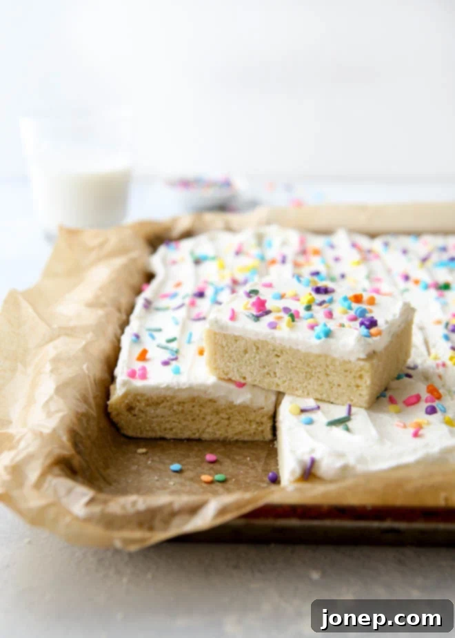 Chewy Sugar Cookie Bars 2 These soft sugar cookie bars with buttercream frosting are the perfect treats for a crowd!
