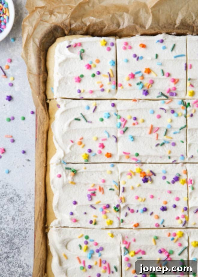 Chewy Sugar Cookie Bars 3 Frosted sugar bars sliced and ready to serve