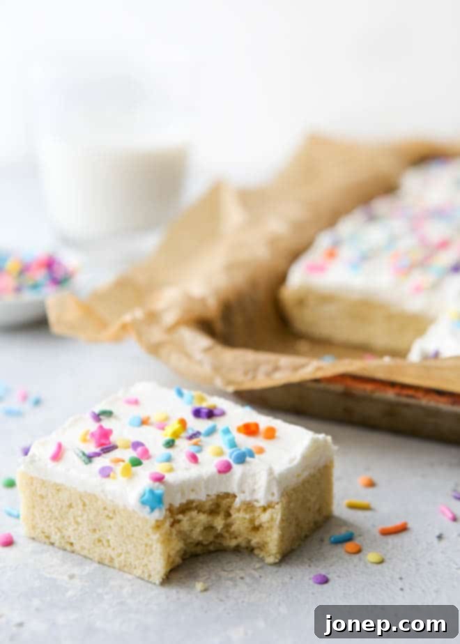 Chewy Sugar Cookie Bars 6 These soft sugar cookie bars with buttercream frosting are the perfect treats for a crowd!