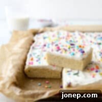 Chewy Sugar Cookie Bars 7 These soft sugar cookie bars with buttercream frosting are the perfect treats for a crowd!