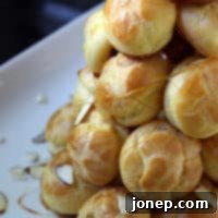 Crunchy Almond Croquembouche 2 A vibrant, delicious Almond Croquembouche, ready to be enjoyed as a festive dessert.