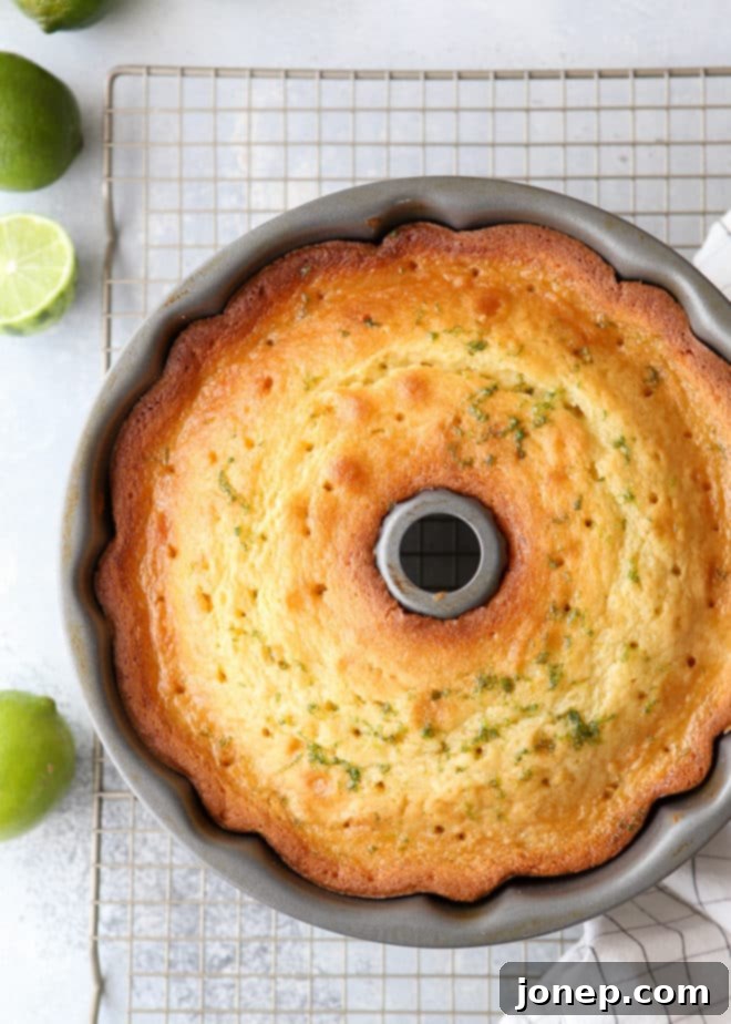 A lime simple syrup drizzled over the cake after baking keeps the cake super moist and gives it an intense lime flavor.