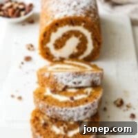 Classic Pumpkin Roll 11 pumpkin swiss roll cake with candied pecans