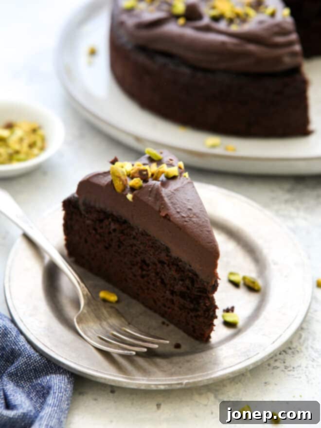 slice of chocolate olive oil cake on a plate