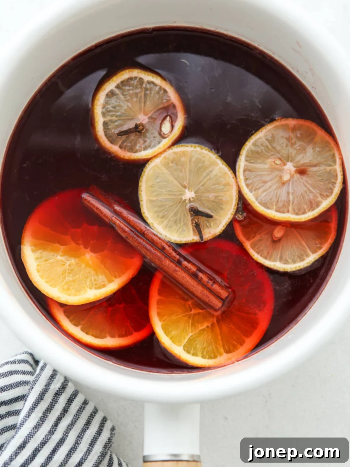 Making a cranberry syrup base for holiday punch