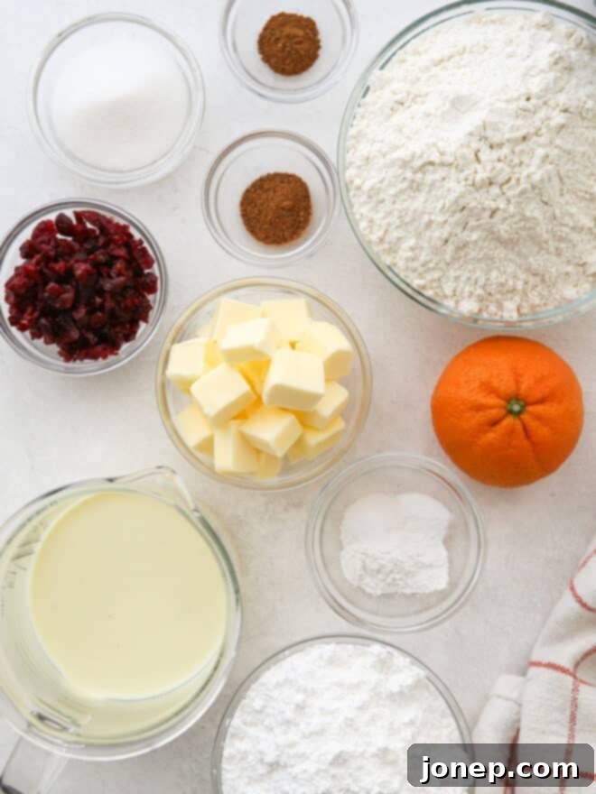 Eggnog Cranberry Scones
Festive Cranberry Eggnog Scones 4 Close-up shot of freshly baked eggnog cranberry scones, highlighting their flaky layers and moist interior.