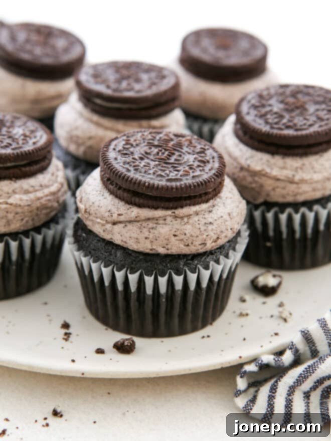 Oreo Bliss Bites 2 Oreo cupcakes on a platter, ready to be served and enjoyed.