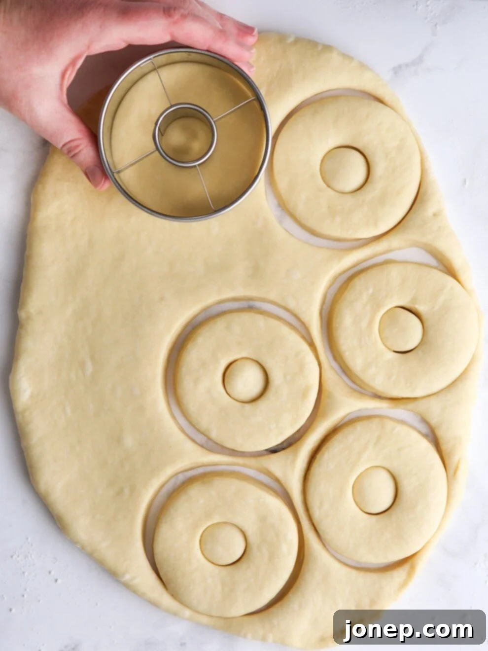 Snug Saturday Treats 6 Rolling out and cutting homemade doughnuts